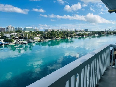 WATERFRONT TOP FLOOR UNIT WITH GORGEOUS STUNNING WATER VIEWS!
