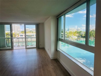WATERFRONT TOP FLOOR UNIT WITH GORGEOUS STUNNING WATER VIEWS!
