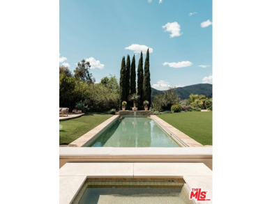 At the end of a cul-de-sac in ultra-exclusive Brentwood Country