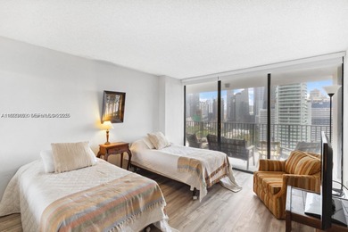 Live above it all from the 24th floor of Brickell Place Tower B!