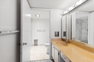 Live above it all from the 24th floor of Brickell Place Tower B!