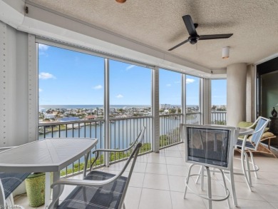 STUNNING GULF VIEWS & BOAT SLIP INCLUDED! This 9th-floor sky
