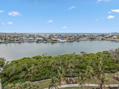 STUNNING GULF VIEWS & BOAT SLIP INCLUDED! This 9th-floor sky