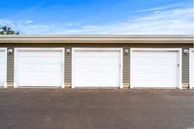 TOP FLOOR UNIT, ELEVATOR BUILDING, INCLUDED ONE CAR GARAGE, GOLF