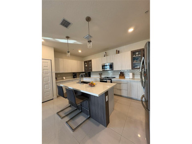 Stunning corner 4-story Townhome at URBANA with view of Paseo