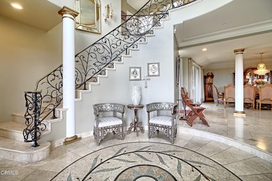 Experience elevated coastal living at its finest from this