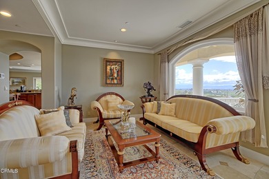 Experience elevated coastal living at its finest from this