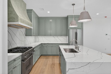 Welcome to 779 Riverland a stunning new construction home on