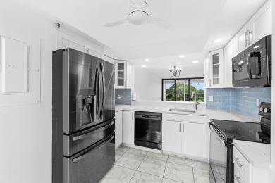 Beautifully renovated home with an amazing lake and golf view in