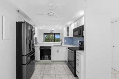 Beautifully renovated home with an amazing lake and golf view in