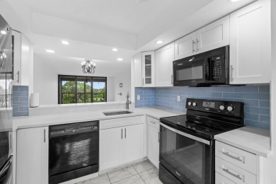 Beautifully renovated home with an amazing lake and golf view in