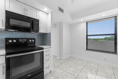 Beautifully renovated home with an amazing lake and golf view in