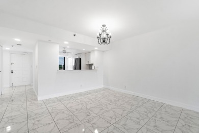 Beautifully renovated home with an amazing lake and golf view in