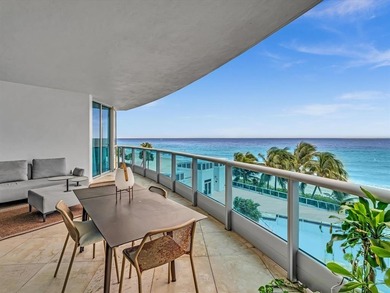 Experience luxury oceanfront living in this renovated 2-bedroom