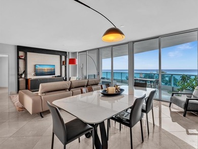 Experience luxury oceanfront living in this renovated 2-bedroom