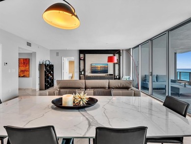 Experience luxury oceanfront living in this renovated 2-bedroom