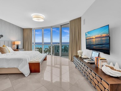 Experience luxury oceanfront living in this renovated 2-bedroom