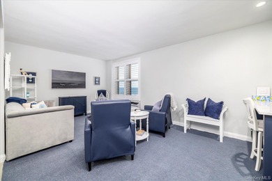 Prepare to be wowed! This beautifully renovated, sun-filled one