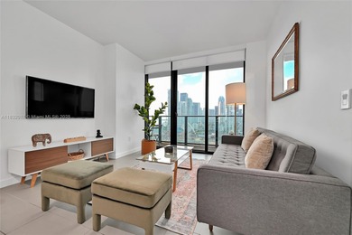 Spacious high-floor corner 2BD/2BA unit in the heart of the Arts