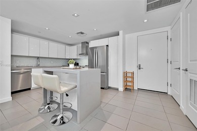 Spacious high-floor corner 2BD/2BA unit in the heart of the Arts