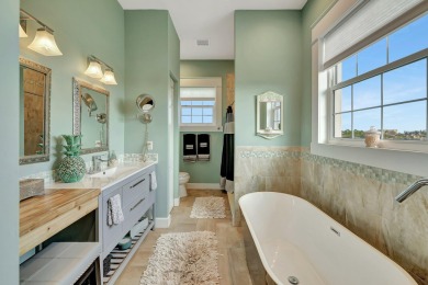 Enjoy paradise on South Hutchison Island from this beautiful