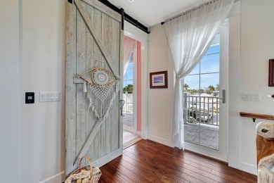 Enjoy paradise on South Hutchison Island from this beautiful