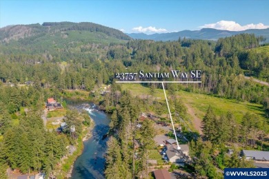 New Price on this Riverfront Gem! Experience refined living in