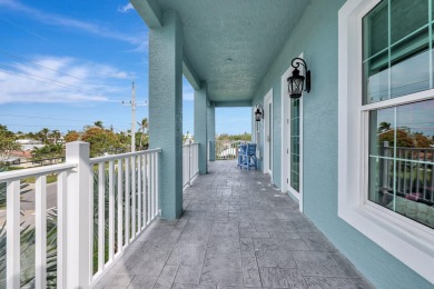 Enjoy paradise on South Hutchison Island from this beautiful