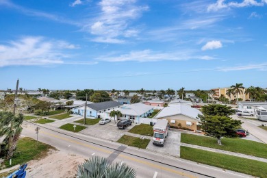 Enjoy paradise on South Hutchison Island from this beautiful