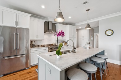 Welcome to this elegant two-bedroom penthouse residence at Tides