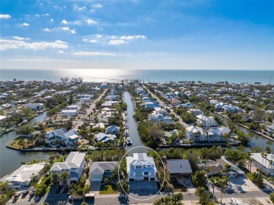 Experience the charm of Anna Maria Island with this NEWLY