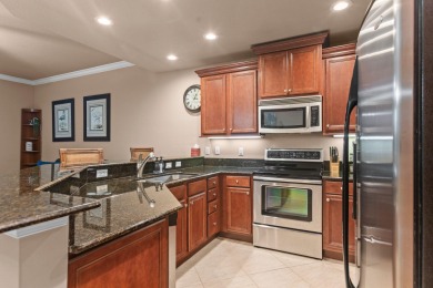 Nestled in the last building of the community, this townhome