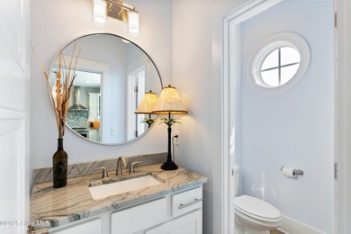 Discover one of Kure Beach's premier properties - a truly