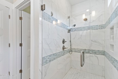 Discover one of Kure Beach's premier properties - a truly