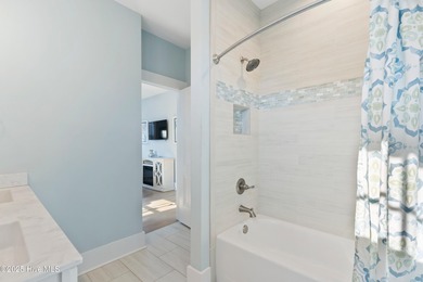 Discover one of Kure Beach's premier properties - a truly