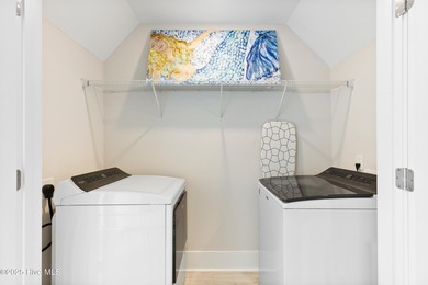 Discover one of Kure Beach's premier properties - a truly