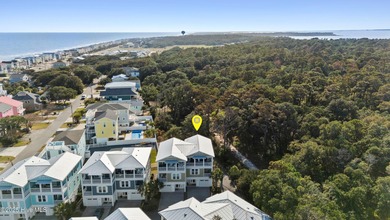Discover one of Kure Beach's premier properties - a truly