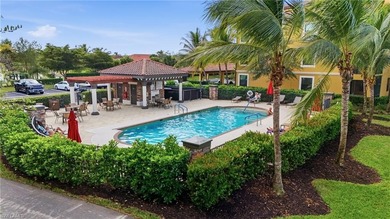 This rarely available second-floor end unit in Bonita National