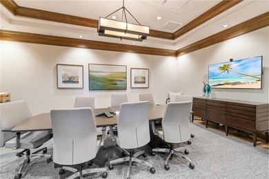 This rarely available second-floor end unit in Bonita National