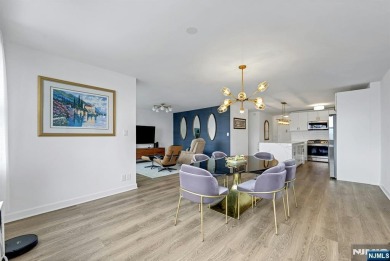 Experience luxury high-rise living at its finest in this