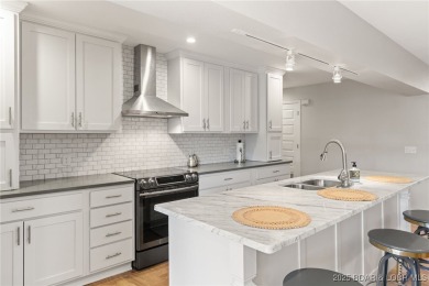 Better than New!! Smaller Condo Community right in the heart of