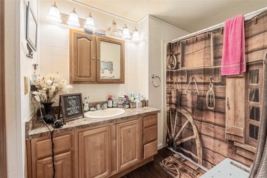 Enjoy Privacy and Freedom in Lakeland! This 3 bedroom, 2