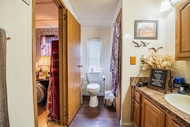 Enjoy Privacy and Freedom in Lakeland! This 3 bedroom, 2