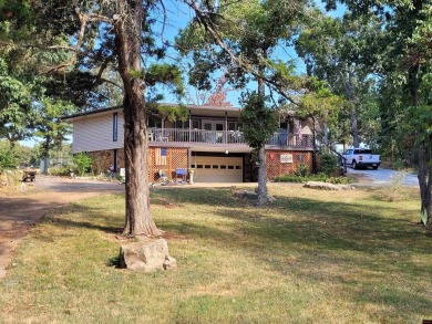 Nestled on two nice lots in the picturesque community of