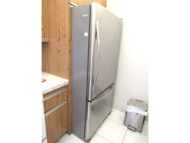 TURNKEY 1 BEDROOM, 1.5 BATHS. TILE IN LIVING AREAS, CARPET IN