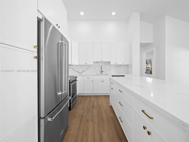 Fully renovated 3-bedroom, 3-bathroom residence in the highly