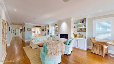 Experience elevated coastal living on highly sought-after