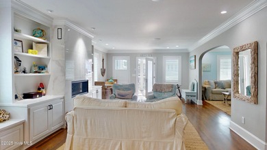 Experience elevated coastal living on highly sought-after