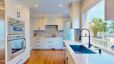 Experience elevated coastal living on highly sought-after