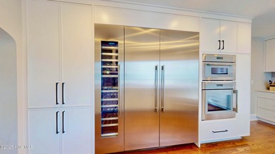 Experience elevated coastal living on highly sought-after